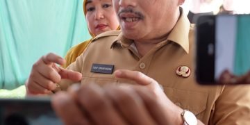 Luncurkan Program UHC Prioritas Kota Binjai, Sekdaprov Sumut Ingatkan Pelayanan Kesehatan Berjalan Optimal