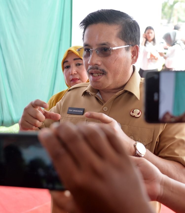 Luncurkan Program UHC Prioritas Kota Binjai, Sekdaprov Sumut Ingatkan Pelayanan Kesehatan Berjalan Optimal