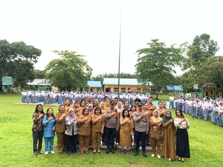 Polsek Kutalimbaru Gelar “Police Go to School” di SMA Negeri 1 Kutalimbaru