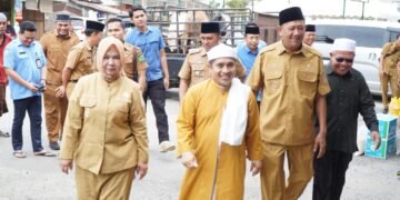 Syah Afandin Serahkan Bantuan untuk Haul Tuan Guru Besilam ke-102