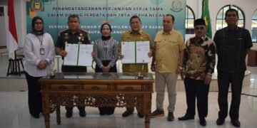 Sekretaris DPRD dan Kajari Langkat Teken MoU Penanganan Masalah Hukum