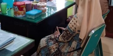 Pelayanan Pasca Libur, KUA Medan Perjuangan Suguhkan Kue Lebaran
