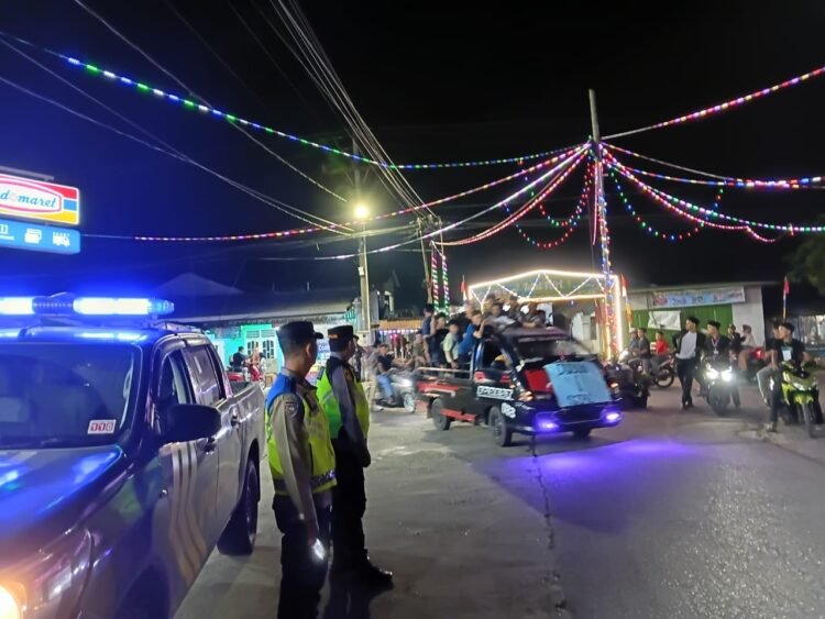 Polsek Kutalimbaru dan Koramil 02/KTB Amankan Malam Takbiran Idul Fitri 1447 H di Sei Mencirim