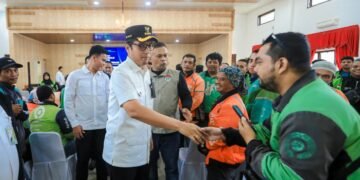 Lindungi Ojol dari Risiko Jalanan, Rico Waas Serahkan Kartu BPJS Ketenagakerjaan untuk Ribuan Driver di Medan