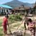 Bhabinkamtibmas Polsek Juhar Gotong Royong Bersama Warga, Perkuat Sinergi Jaga Kamtibmas Desa