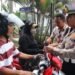 Polres Langkat Bagikan 500 Bendera Merah Putih, Bangkitkan Semangat Kemerdekaan di Tengah Masyarakat