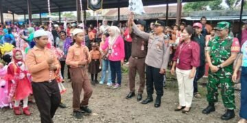 Polsek Tigabinanga Amankan Pawai Drumben PAUD, TK, dan SD Sambut HUT ke-81 RI