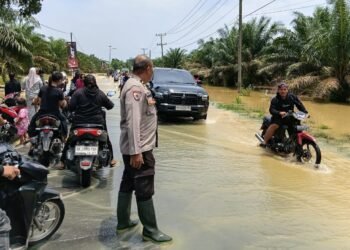 Jalan Sumor Bor-Tanjung Selamat Direndam Banjir
