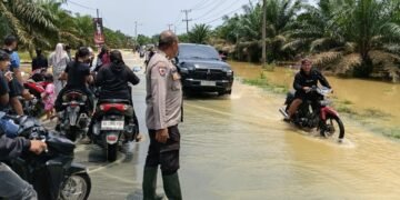 Jalan Sumor Bor-Tanjung Selamat Direndam Banjir