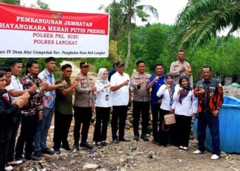 Polsek Pangkalan Susu Bangun Jembatan Bhayangkara Merah Putih