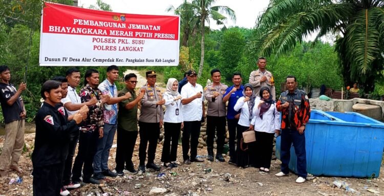 Polsek Pangkalan Susu Bangun Jembatan Bhayangkara Merah Putih
