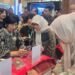Gubernur BI Destry Damayanti Coba Langsung QRESTO di Booth Pemkot Medan 